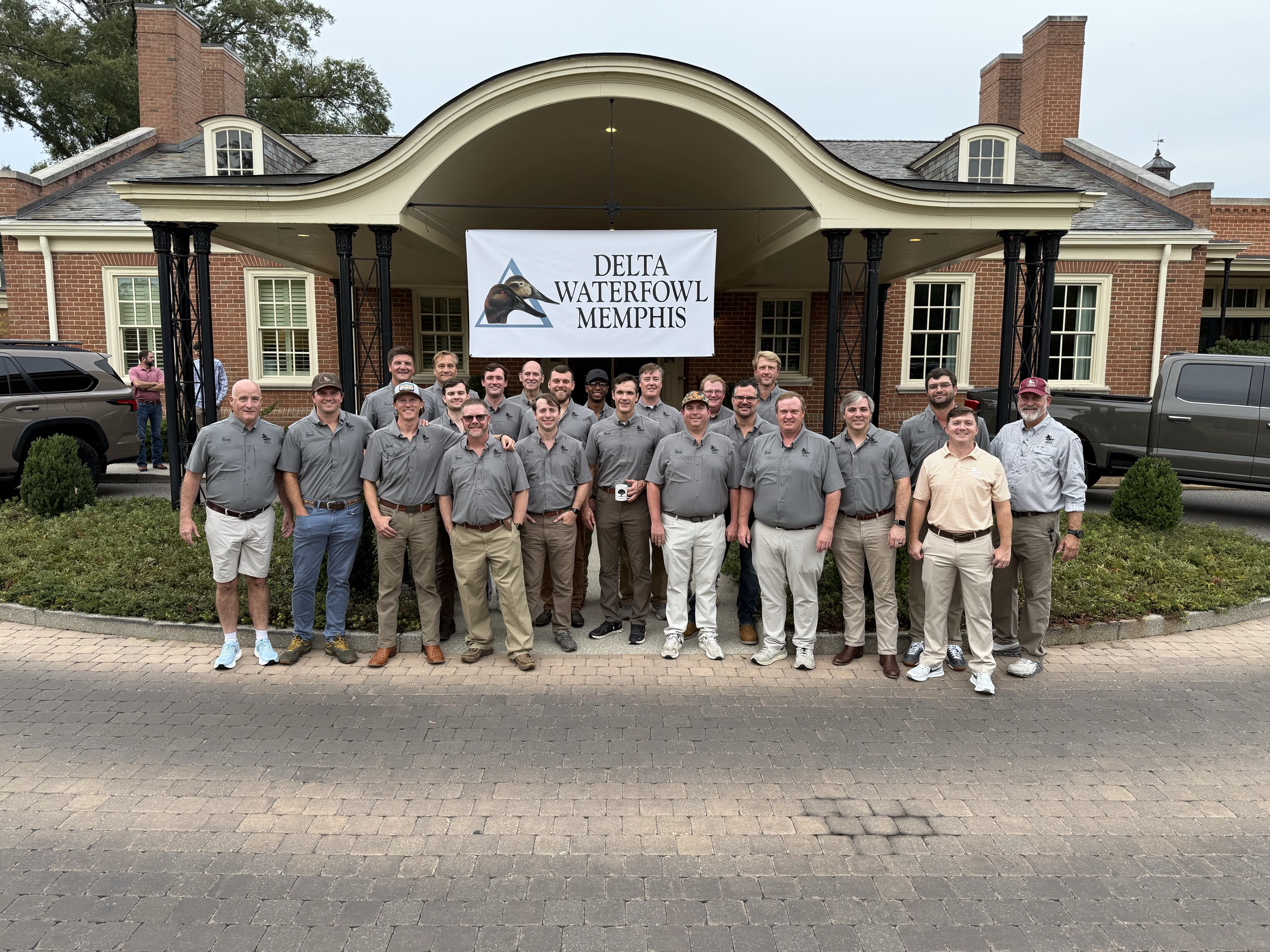 The Memphis chapter gathered outside the clubhouse before a banquet