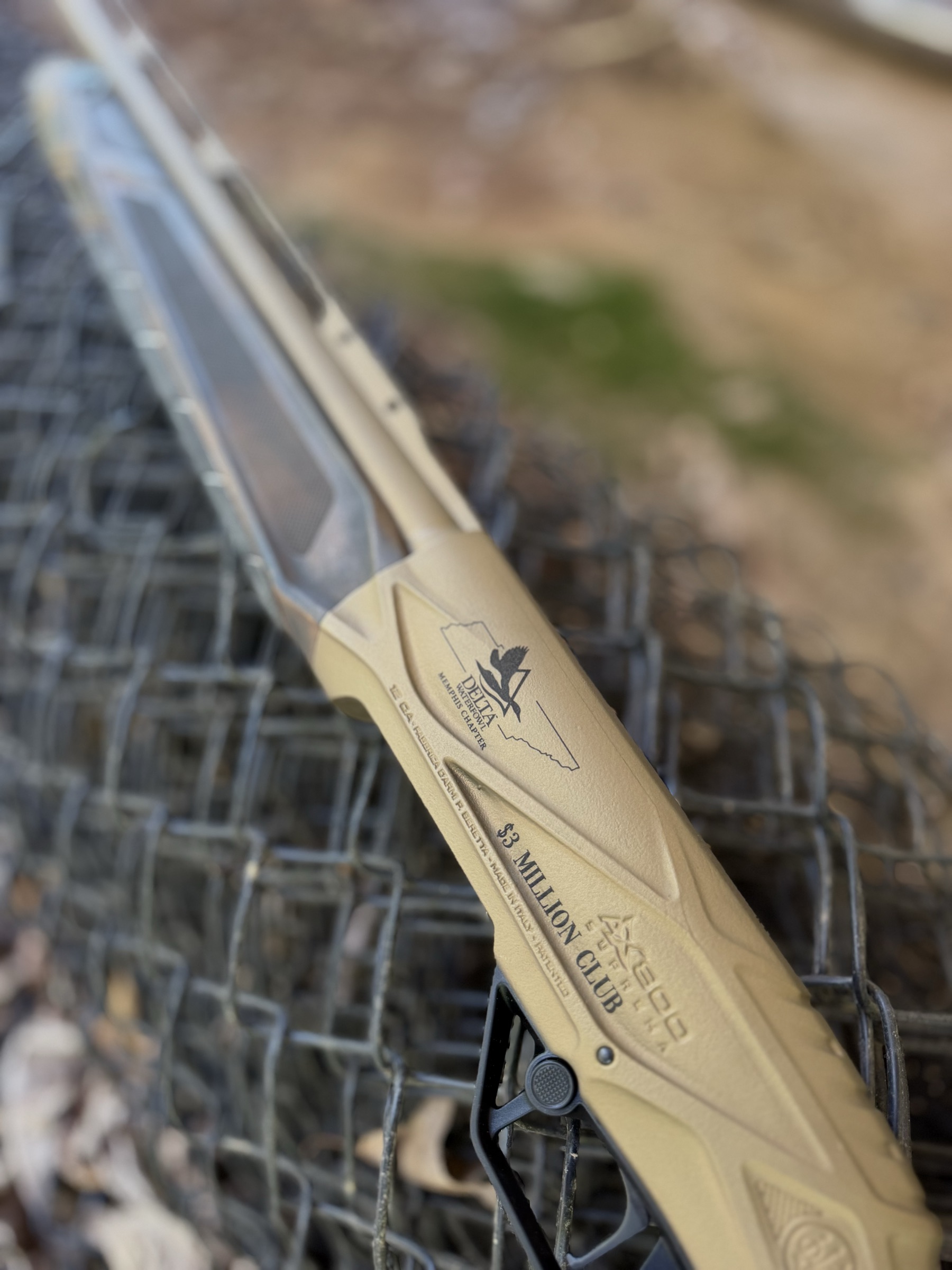 The Delta Waterfowl Memphis Chapter mark and “$3 Million Club” engraved on the receiver of the Beretta AX800 Suprema.